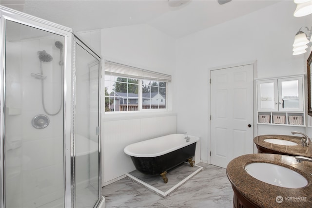 bathroom featuring vanity and separate shower and tub