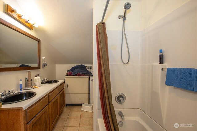 full bath featuring a sink, tile patterned floors, double vanity, and shower / tub combo with curtain