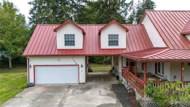 view of front of property featuring metal roof, a standing seam roof, and concrete driveway