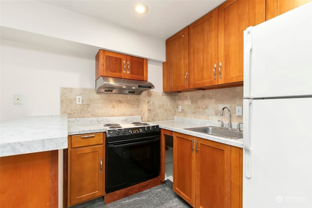 kitchen featuring white refrigerator, tasteful backsplash, black electric range, and sink