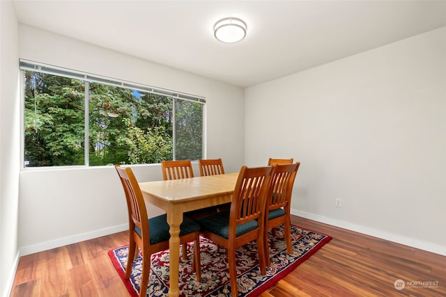 dining area featuring hardwood / wood-style floors