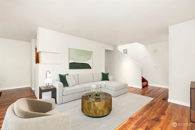 living room with wood-type flooring