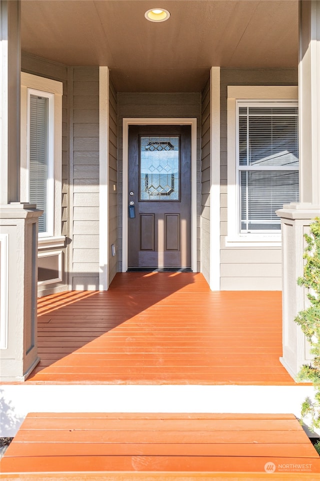 entrance to property with covered porch