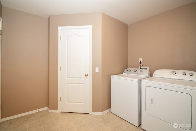 laundry area with washer and clothes dryer