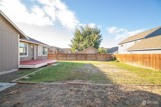 view of yard featuring a deck