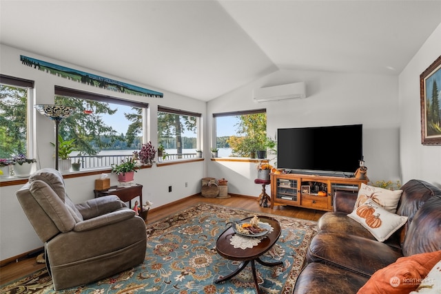 living room with an AC wall unit, wood-type flooring, and vaulted ceiling