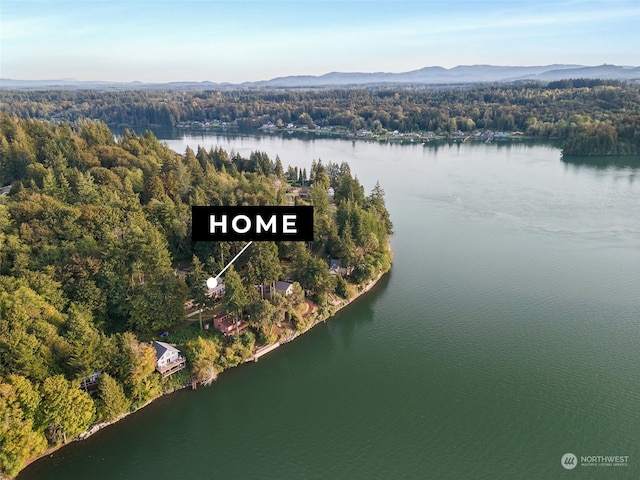 aerial view featuring a water and mountain view