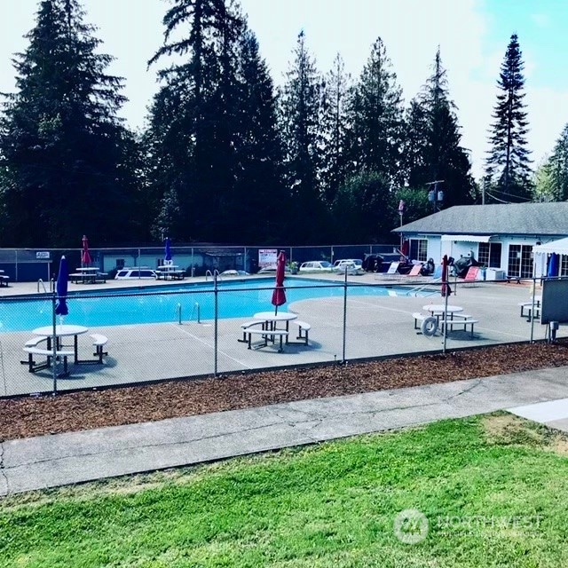 view of swimming pool featuring a patio