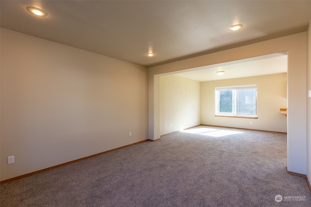 spare room with carpet floors