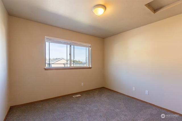 view of carpeted spare room