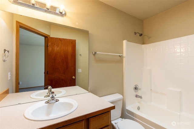 full bathroom featuring vanity, toilet, and shower / bathtub combination