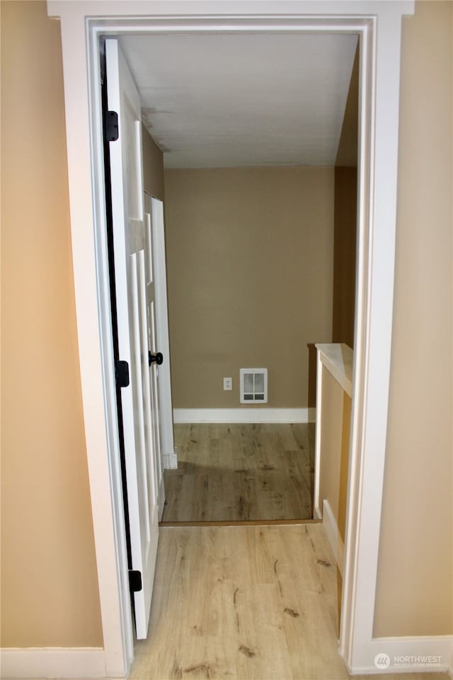 hall featuring light hardwood / wood-style floors