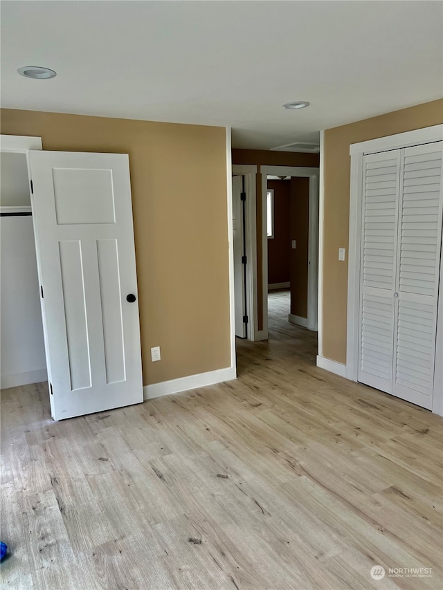 unfurnished bedroom featuring light hardwood / wood-style floors