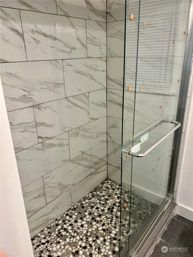 bathroom with an enclosed shower