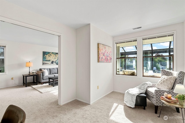 4152 Providence Point Dr SE Unit 207, Issaquah, WA 98029 - sitting room featuring carpet floors and baseboards