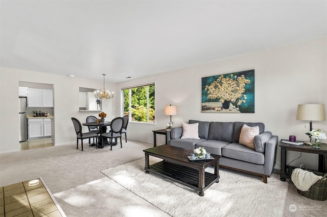 4152 Providence Point Dr SE Unit 207, Issaquah, WA 98029 - living area featuring a chandelier, light carpet, and baseboards