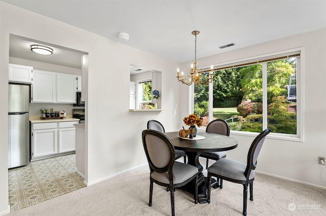 4152 Providence Point Dr SE Unit 207, Issaquah, WA 98029 - dining room with a chandelier, light carpet, baseboards, and plenty of natural light