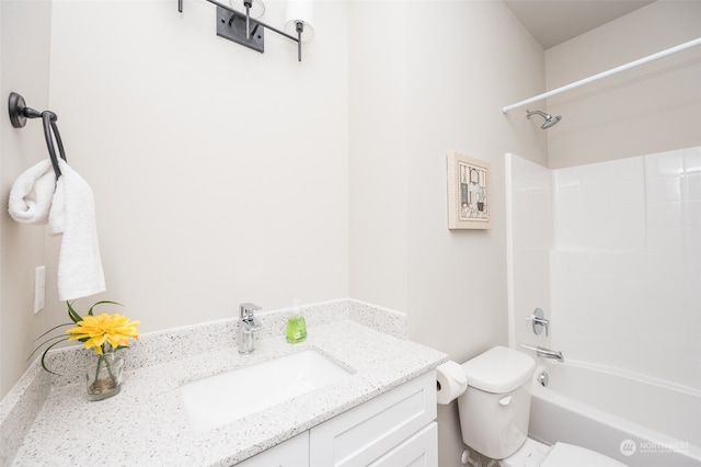 full bathroom with shower / bathing tub combination, vanity, and toilet