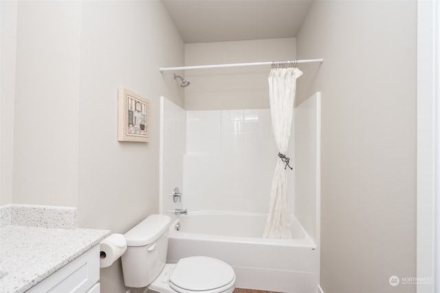 full bathroom with shower / tub combo, vanity, and toilet