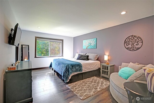 bedroom featuring dark hardwood / wood-style floors