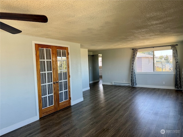 unfurnished room with french doors, a textured ceiling, dark wood-type flooring, and a baseboard heating unit