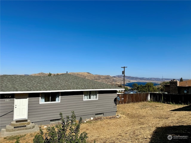 view of side of property featuring a mountain view