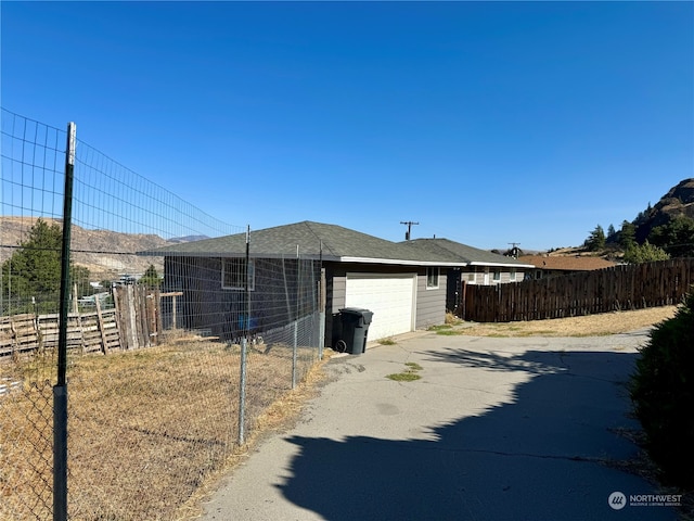 view of home's exterior featuring a garage