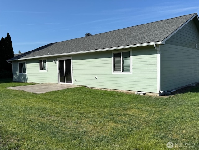 1507 S 5th St, Dayton, WA 99328 - back of property with a patio, a yard, and roof with shingles