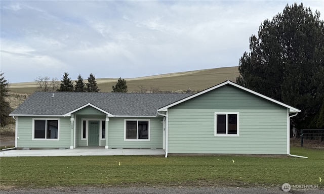 1507 S 5th St, Dayton, WA 99328 - single story home featuring a front lawn, a patio area, and roof with shingles