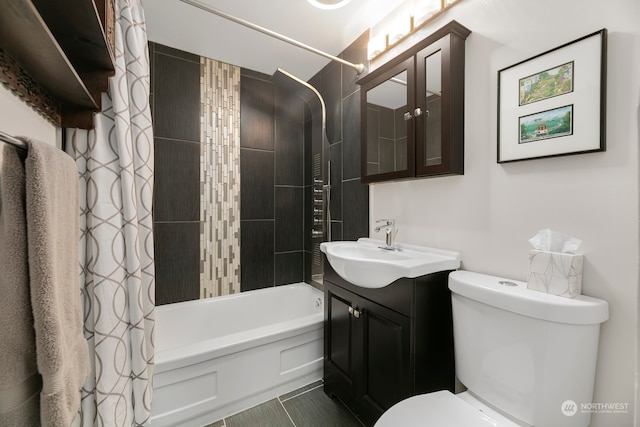 full bathroom with vanity, shower / tub combo, toilet, and tile patterned flooring