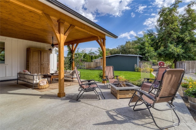 1145 School Ave, Walla Walla, WA 99362 - view of patio featuring a fire pit, a ceiling fan, and an outdoor structure