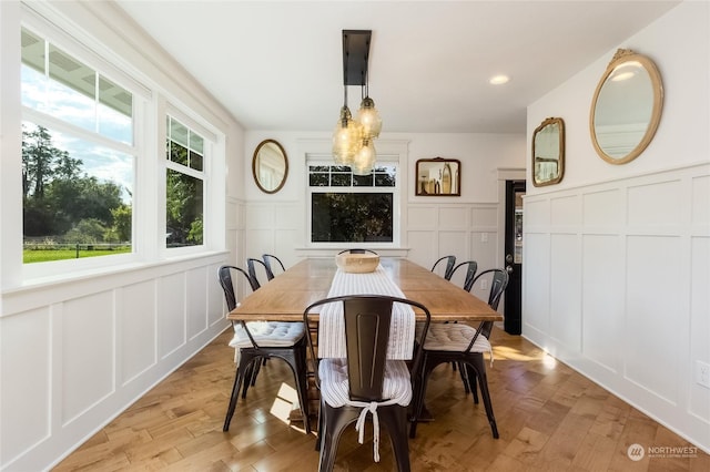 1145 School Ave, Walla Walla, WA 99362 - dining room featuring a decorative wall, light wood-type flooring, wainscoting, and recessed lighting