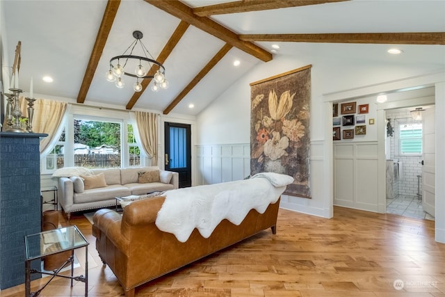 1145 School Ave, Walla Walla, WA 99362 - living room with a chandelier, light wood-style floors, a wainscoted wall, a decorative wall, and recessed lighting