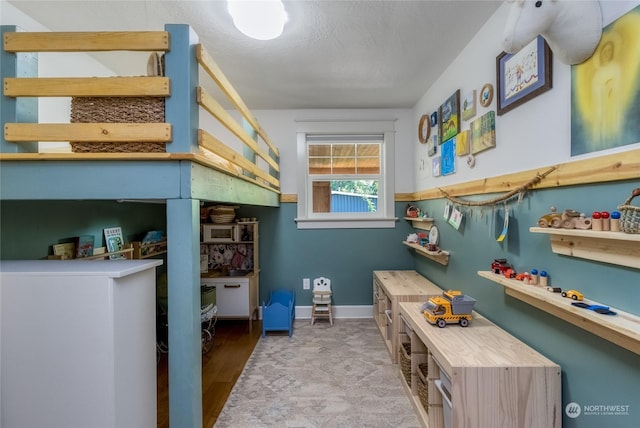 1145 School Ave, Walla Walla, WA 99362 - bedroom with baseboards and wood finished floors