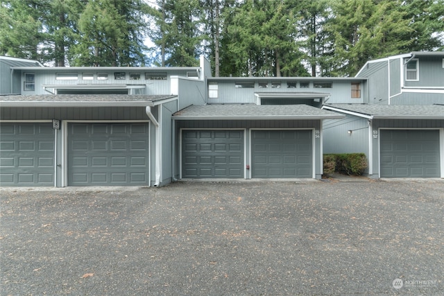 exterior space with a garage