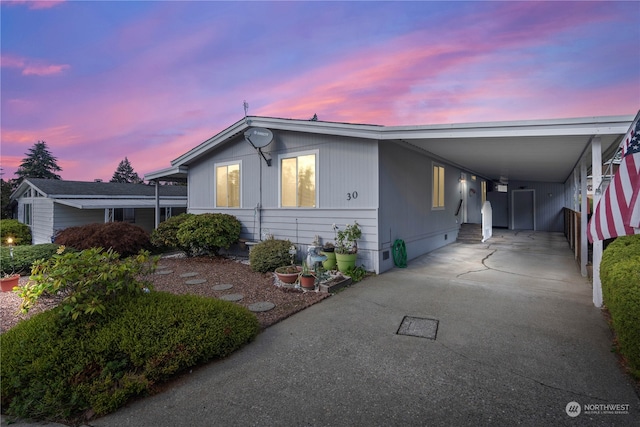 view of front facade featuring a carport