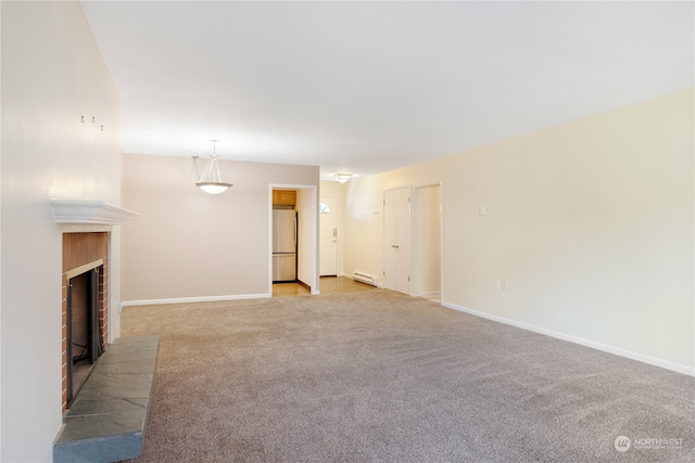 unfurnished living room with light colored carpet and a baseboard heating unit