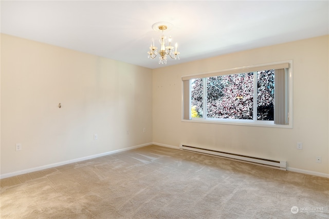 carpeted spare room with a baseboard heating unit and a chandelier