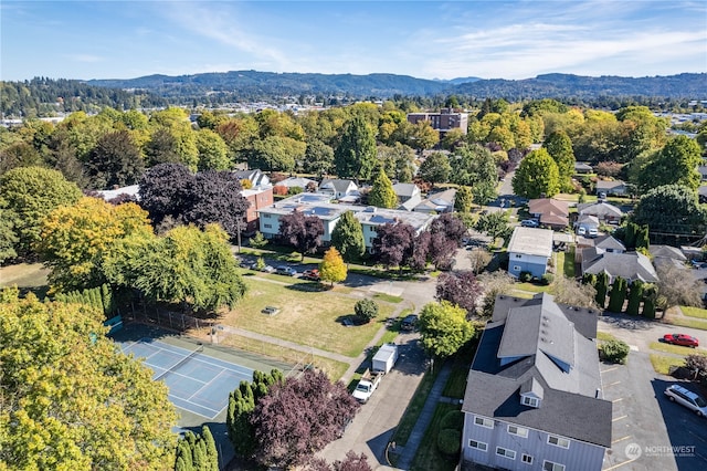 birds eye view of property featuring a mountain view