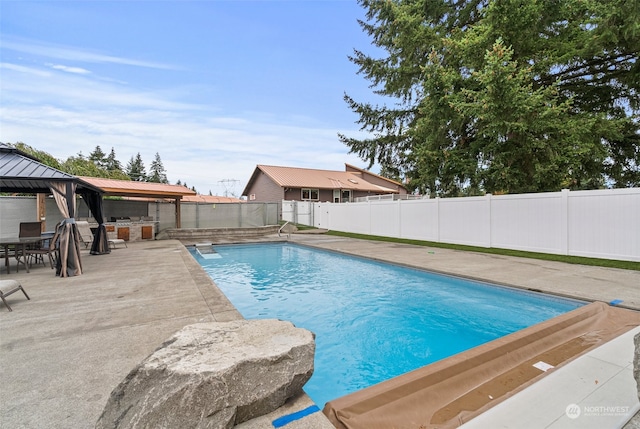 view of pool featuring a patio area and a gazebo