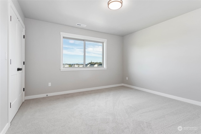 unfurnished room with carpet