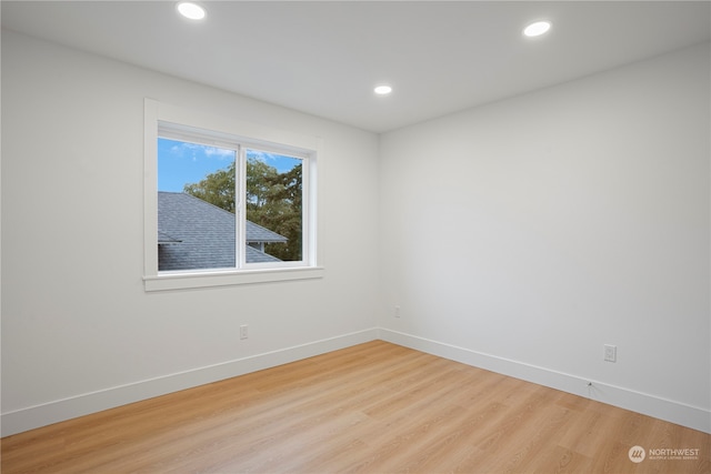 spare room with light wood-type flooring