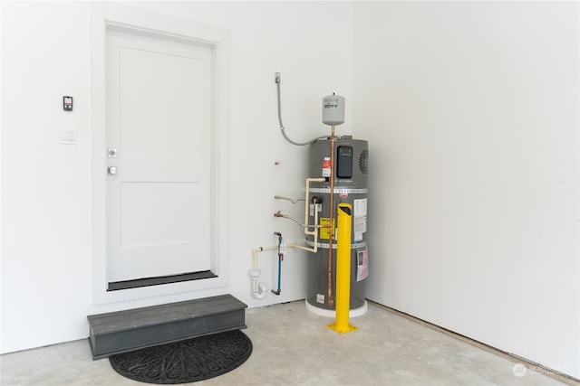 utility room with water heater