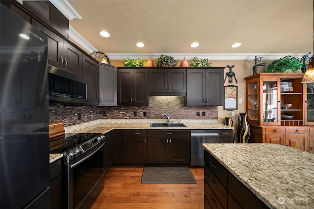 9225 Red Cliff Dr NW Unit B53, Quincy, WA 98848 - kitchen featuring freestanding refrigerator, wood finished floors, dishwasher, a sink, and range with electric cooktop