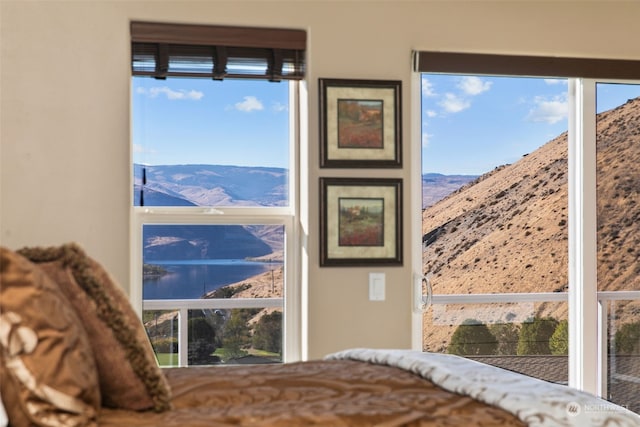9225 Red Cliff Dr NW Unit B53, Quincy, WA 98848 - bedroom featuring a water and mountain view and multiple windows
