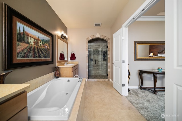9225 Red Cliff Dr NW Unit B53, Quincy, WA 98848 - bathroom featuring a garden tub, a shower stall, vanity, visible vents, and tile patterned floors