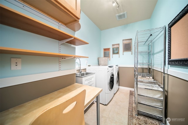 9225 Red Cliff Dr NW Unit B53, Quincy, WA 98848 - laundry room with visible vents, light tile patterned floors, washer and dryer, a sink, and cabinet space
