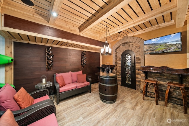 9225 Red Cliff Dr NW Unit B53, Quincy, WA 98848 - interior space with beamed ceiling, wooden ceiling, wood walls, wood finished floors, and a notable chandelier