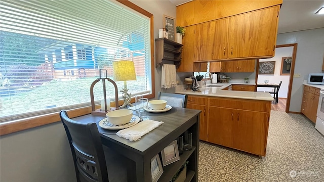 kitchen with sink and white appliances