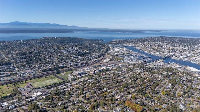 bird's eye view featuring a water and mountain view